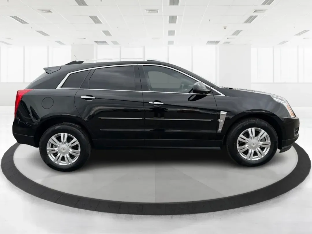 2012 Cadillac SRX Luxury Collection (3GYFNAE33CS) with an 3.6L V-6 gasoline direct injection engine, located at 401 Woodman Dr, Riverside, OH, 45431, (937) 908-9800, 39.760899, -84.123421 - **Experience the Luxury of the 2012 Cadillac SRX: Your Perfect Family SUV Awaits!**<br /> <br /> Are you in search of a vehicle that seamlessly marries style, comfort, and practicality? Whether you're looking for a family-friendly SUV for school drop-offs, a reliable companion for long commutes, or - Photo#1