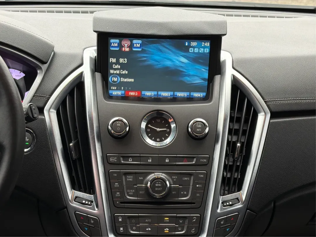 2012 Cadillac SRX Luxury Collection (3GYFNAE33CS) with an 3.6L V-6 gasoline direct injection engine, located at 401 Woodman Dr, Riverside, OH, 45431, (937) 908-9800, 39.760899, -84.123421 - **Experience the Luxury of the 2012 Cadillac SRX: Your Perfect Family SUV Awaits!**<br /> <br /> Are you in search of a vehicle that seamlessly marries style, comfort, and practicality? Whether you're looking for a family-friendly SUV for school drop-offs, a reliable companion for long commutes, or - Photo#13