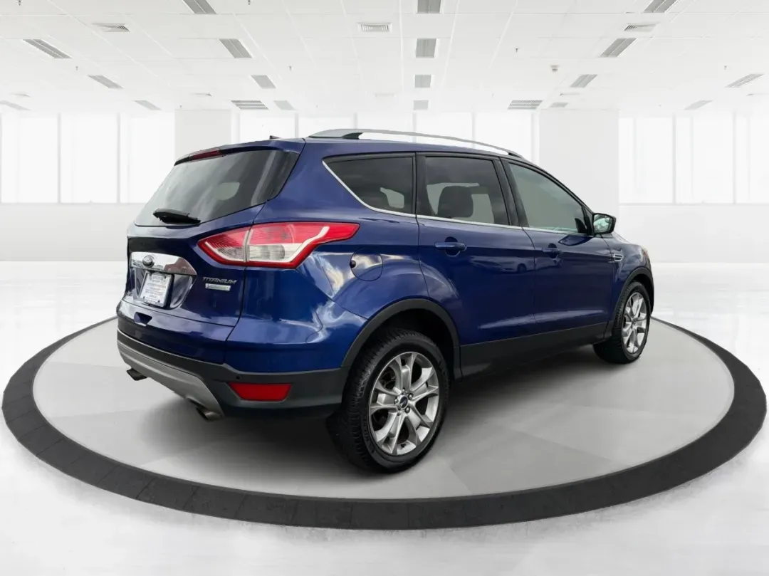 2015 Ford Escape Titanium (1FMCU0J92FU) with an Other engine, located at 880 E. National Road, Vandalia, OH, 45377, (937) 908-9800, 39.891918, -84.183594 - **Adventure Awaits with the 2015 Ford Escape Titanium Your Ideal SUV for Every Journey!**<br /> <br /> Are you looking for the perfect vehicle to accommodate family outings, weekend adventures, or long commutes? The 2015 Ford Escape Titanium, available now at Advantage Car and Credit in Vandalia, O - Photo#2