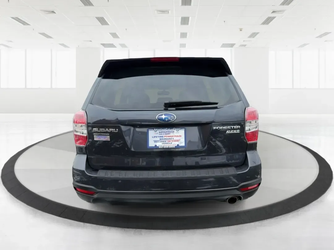 2015 Subaru Forester 2.5i Limited (JF2SJAKC0FH) with an 2.5L H-4 DOHC engine, located at 1184 Kauffman Ave, Fairborn, OH, 45324, (937) 908-9800, 39.807072, -84.030914 - Unleash your adventures with the 2015 Subaru Forester 2.5i Limited, a versatile SUV perfect for budget-conscious buyers seeking style, comfort, and capability. Whether you're planning weekend getaways in nearby Yellow Springs or commuting through Fairborn's bustling streets, this vehicle is designed - Photo#3