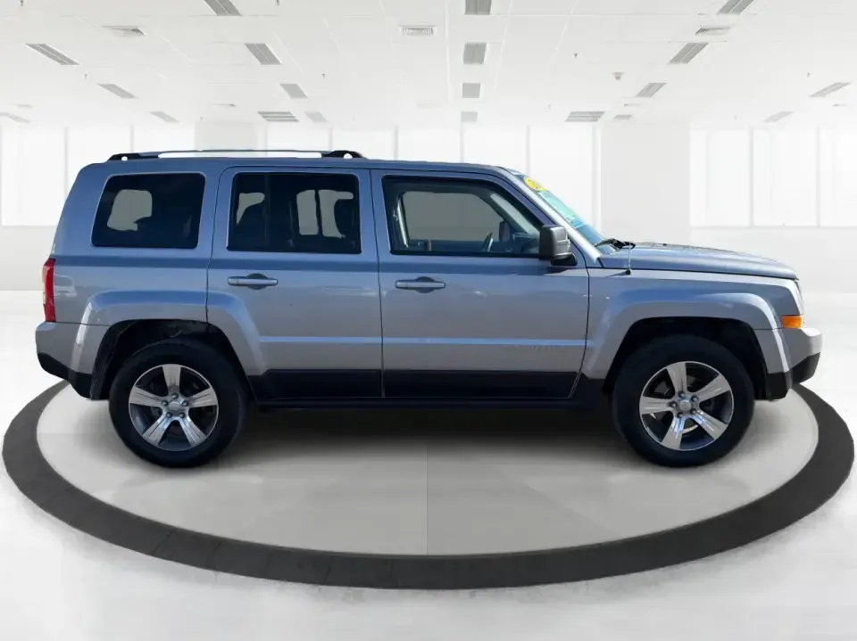 2016 Jeep Patriot Latitude 4WD (1C4NJRFB2GD) with an 2.4L L4 DOHC 16V engine, Automatic transmission, located at 401 Woodman Dr, Riverside, OH, 45431, (937) 908-9800, 39.760899, -84.123421 - Weekend trailheads, snowy school runs, and everyday commuting around the Miami Valley all feel easier when you've got an SUV that's sized right, confident in rough weather, and comfortable for five. This 2016 Jeep Patriot Latitude 4WD is a smart pick for drivers who want Jeep practicality without th- Photo#1