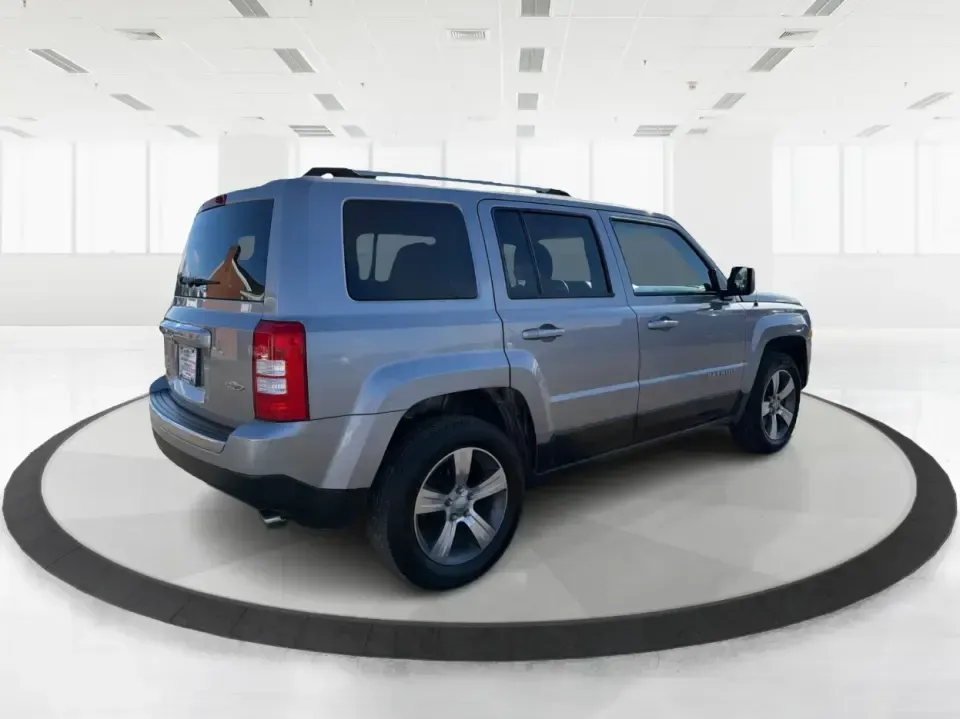 2016 Jeep Patriot Latitude 4WD (1C4NJRFB2GD) with an 2.4L L4 DOHC 16V engine, Automatic transmission, located at 401 Woodman Dr, Riverside, OH, 45431, (937) 908-9800, 39.760899, -84.123421 - Weekend trailheads, snowy school runs, and everyday commuting around the Miami Valley all feel easier when you've got an SUV that's sized right, confident in rough weather, and comfortable for five. This 2016 Jeep Patriot Latitude 4WD is a smart pick for drivers who want Jeep practicality without th- Photo#2