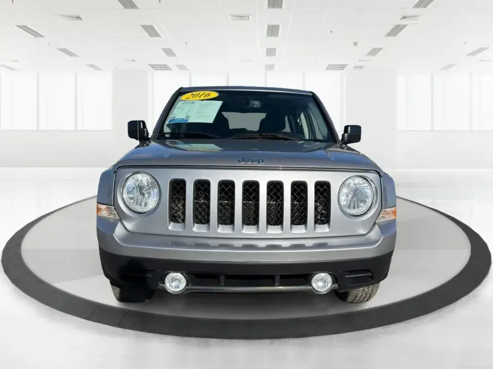 2016 Jeep Patriot Latitude 4WD (1C4NJRFB2GD) with an 2.4L L4 DOHC 16V engine, Automatic transmission, located at 401 Woodman Dr, Riverside, OH, 45431, (937) 908-9800, 39.760899, -84.123421 - Weekend trailheads, snowy school runs, and everyday commuting around the Miami Valley all feel easier when you've got an SUV that's sized right, confident in rough weather, and comfortable for five. This 2016 Jeep Patriot Latitude 4WD is a smart pick for drivers who want Jeep practicality without th- Photo#7