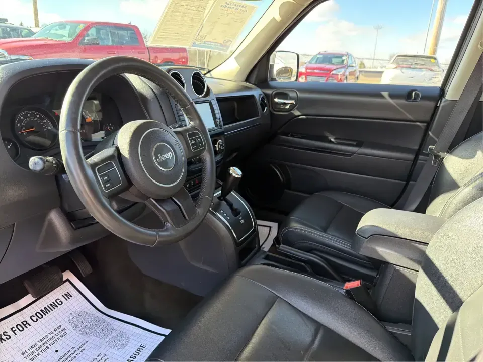 2016 Jeep Patriot Latitude 4WD (1C4NJRFB2GD) with an 2.4L L4 DOHC 16V engine, Automatic transmission, located at 401 Woodman Dr, Riverside, OH, 45431, (937) 908-9800, 39.760899, -84.123421 - Weekend trailheads, snowy school runs, and everyday commuting around the Miami Valley all feel easier when you've got an SUV that's sized right, confident in rough weather, and comfortable for five. This 2016 Jeep Patriot Latitude 4WD is a smart pick for drivers who want Jeep practicality without th- Photo#9