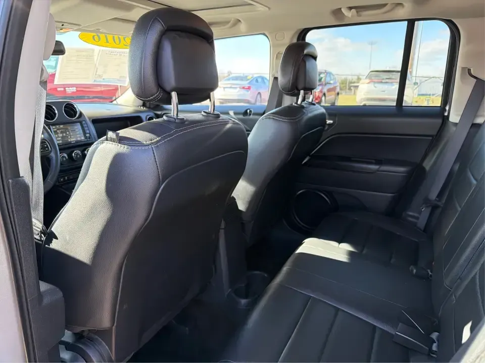 2016 Jeep Patriot Latitude 4WD (1C4NJRFB2GD) with an 2.4L L4 DOHC 16V engine, Automatic transmission, located at 401 Woodman Dr, Riverside, OH, 45431, (937) 908-9800, 39.760899, -84.123421 - Weekend trailheads, snowy school runs, and everyday commuting around the Miami Valley all feel easier when you've got an SUV that's sized right, confident in rough weather, and comfortable for five. This 2016 Jeep Patriot Latitude 4WD is a smart pick for drivers who want Jeep practicality without th- Photo#10