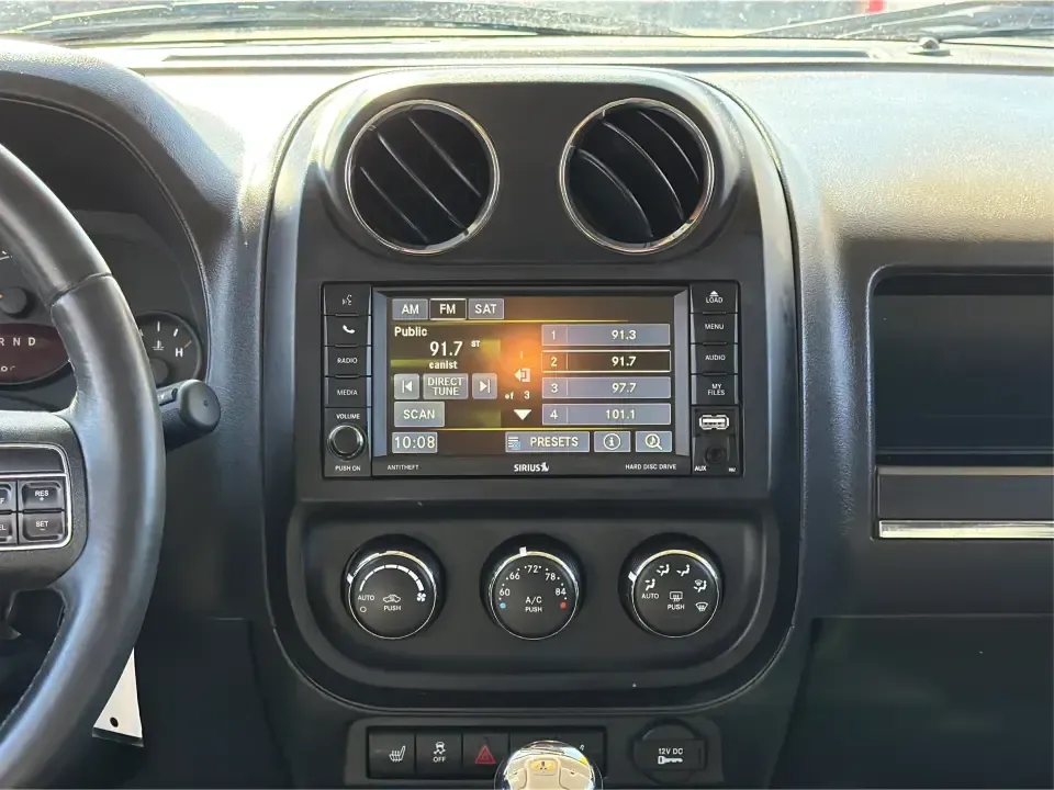 2016 Jeep Patriot Latitude 4WD (1C4NJRFB2GD) with an 2.4L L4 DOHC 16V engine, Automatic transmission, located at 401 Woodman Dr, Riverside, OH, 45431, (937) 908-9800, 39.760899, -84.123421 - Weekend trailheads, snowy school runs, and everyday commuting around the Miami Valley all feel easier when you've got an SUV that's sized right, confident in rough weather, and comfortable for five. This 2016 Jeep Patriot Latitude 4WD is a smart pick for drivers who want Jeep practicality without th- Photo#13
