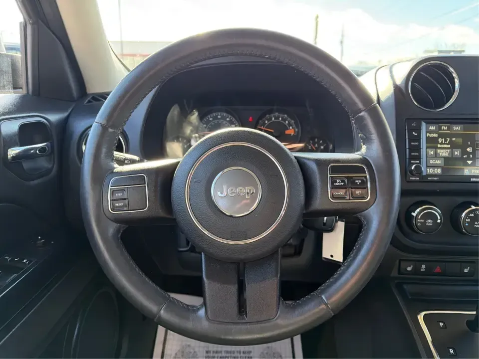 2016 Jeep Patriot Latitude 4WD (1C4NJRFB2GD) with an 2.4L L4 DOHC 16V engine, Automatic transmission, located at 401 Woodman Dr, Riverside, OH, 45431, (937) 908-9800, 39.760899, -84.123421 - Weekend trailheads, snowy school runs, and everyday commuting around the Miami Valley all feel easier when you've got an SUV that's sized right, confident in rough weather, and comfortable for five. This 2016 Jeep Patriot Latitude 4WD is a smart pick for drivers who want Jeep practicality without th- Photo#16