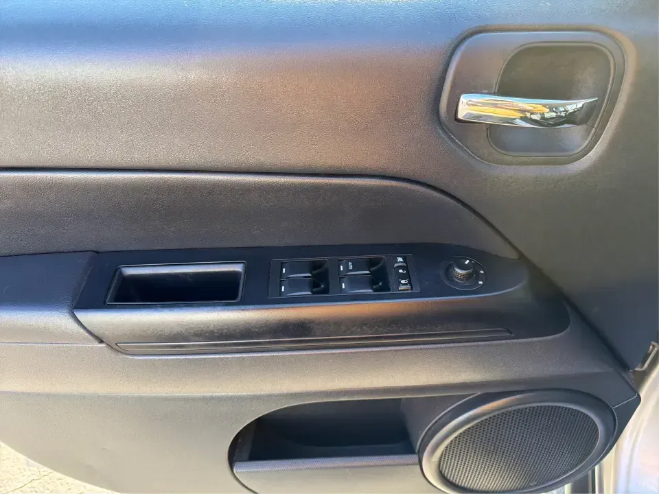 2016 Jeep Patriot Latitude 4WD (1C4NJRFB2GD) with an 2.4L L4 DOHC 16V engine, Automatic transmission, located at 401 Woodman Dr, Riverside, OH, 45431, (937) 908-9800, 39.760899, -84.123421 - Weekend trailheads, snowy school runs, and everyday commuting around the Miami Valley all feel easier when you've got an SUV that's sized right, confident in rough weather, and comfortable for five. This 2016 Jeep Patriot Latitude 4WD is a smart pick for drivers who want Jeep practicality without th- Photo#18