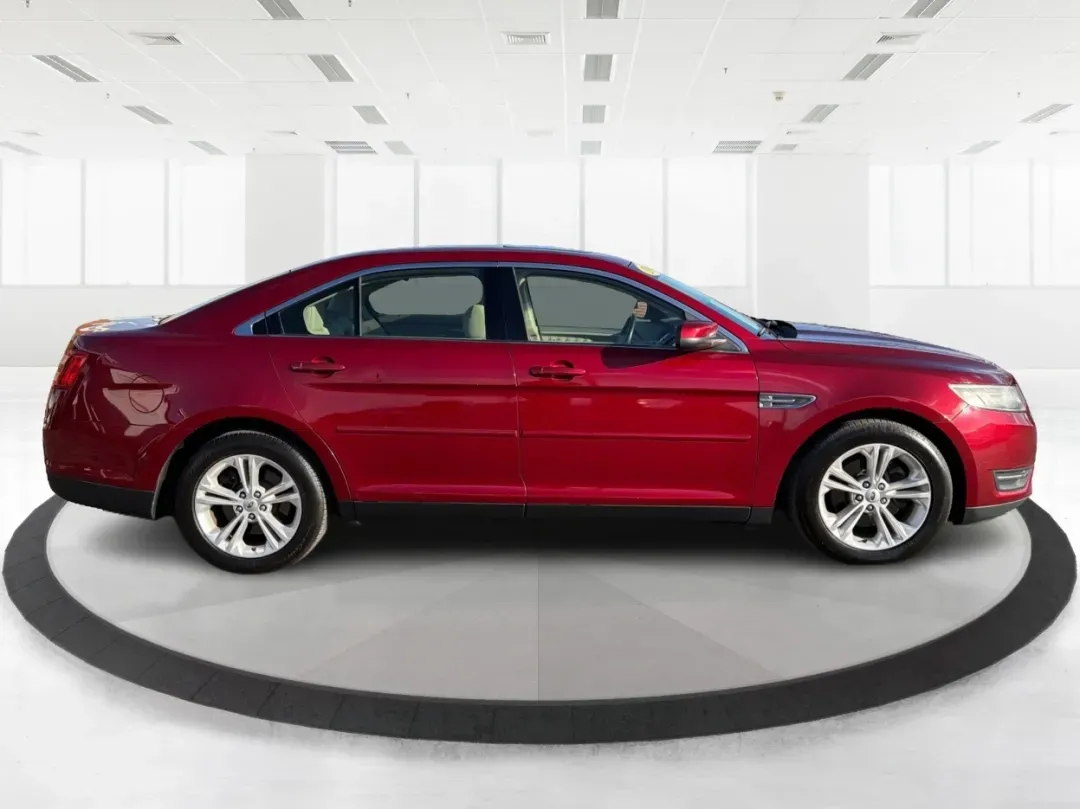 2014 Ford Taurus SEL (1FAHP2E85EG) with an EcoBoost 2L I-4 gasoline direct injection engine, located at 1230 East Main St, Xenia, OH, 45385, (937) 908-9800, 39.688026, -83.910172 - **Experience the Road Like Never Before in Your 2014 Ford Taurus SEL! Perfect for Commuters and Families Alike!**<br /> <br /> Are you ready to elevate your driving experience? The 2014 Ford Taurus SEL is not just a sedan; it's a lifestyle upgrade. Ideal for daily commuters, growing families, or any - Photo#1