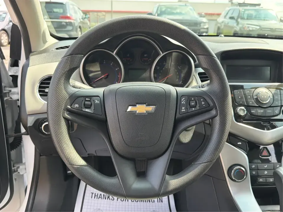 2015 Chevrolet Cruze LS Auto (1G1PA5SH8F7) with an 1.8L L4 DOHC 16V FFV engine, 6-Speed Automatic transmission, located at 1099 N County Rd 25A, Troy, OH, 45373, (937) 908-9800, 40.057079, -84.212883 - Need a smart, budget-friendly commuter that can handle the daily drive from Troy to Dayton, school drop-offs, and the occasional weekend run to The Greene or a day at Troy's Strawberry Festival? This 2015 Chevrolet Cruze LS Auto is built for real life-easy to park downtown near the Square, efficient- Photo#16
