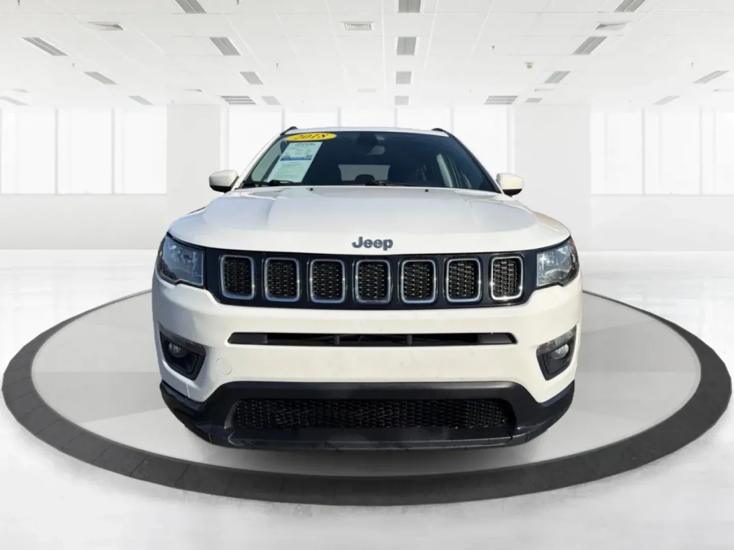 2018 Jeep Compass Latitude 4x4 (3C4NJDBB4JT) with an 2.4L L4 DOHC 16V engine, Manual/Standard transmission, located at 1184 Kauffman Ave, Fairborn, OH, 45324, (937) 908-9800, 39.807072, -84.030914 - Discover the perfect blend of style, reliability, and adventure with the 2018 Jeep Compass Latitude 4x4, now available at Advantage Car and Credit in Fairborn, OH. This rugged yet refined SUV is ideal for weekend warriors and growing families alike, offering the versatility you need for both daily c - Photo#7