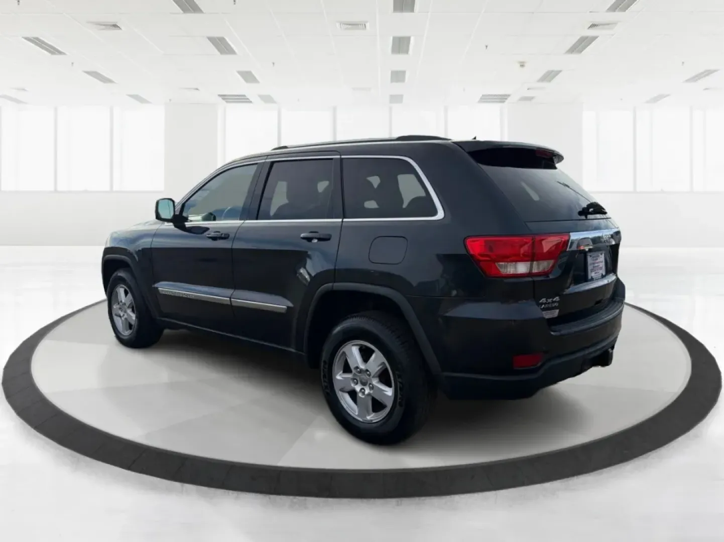 2012 Jeep Grand Cherokee Laredo (1C4RJFAG0CC) with an Other engine, located at 1099 N County Rd 25A, Troy, OH, 45373, (937) 908-9800, 40.057079, -84.212883 - **Adventure Awaits: Explore the Open Road in a 2012 Jeep Grand Cherokee Laredo!**<br /> <br /> If you're a weekend warrior or a growing family looking for your next adventure, this 2012 Jeep Grand Cherokee Laredo is the perfect fit for you! With its robust 4WD capabilities and spacious interior, you - Photo#4