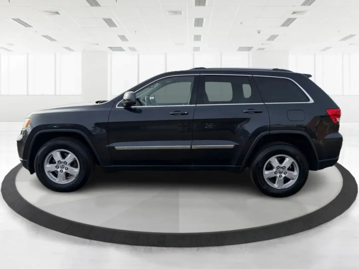 2012 Jeep Grand Cherokee Laredo (1C4RJFAG0CC) with an Other engine, located at 1099 N County Rd 25A, Troy, OH, 45373, (937) 908-9800, 40.057079, -84.212883 - **Adventure Awaits: Explore the Open Road in a 2012 Jeep Grand Cherokee Laredo!**<br /> <br /> If you're a weekend warrior or a growing family looking for your next adventure, this 2012 Jeep Grand Cherokee Laredo is the perfect fit for you! With its robust 4WD capabilities and spacious interior, you - Photo#5