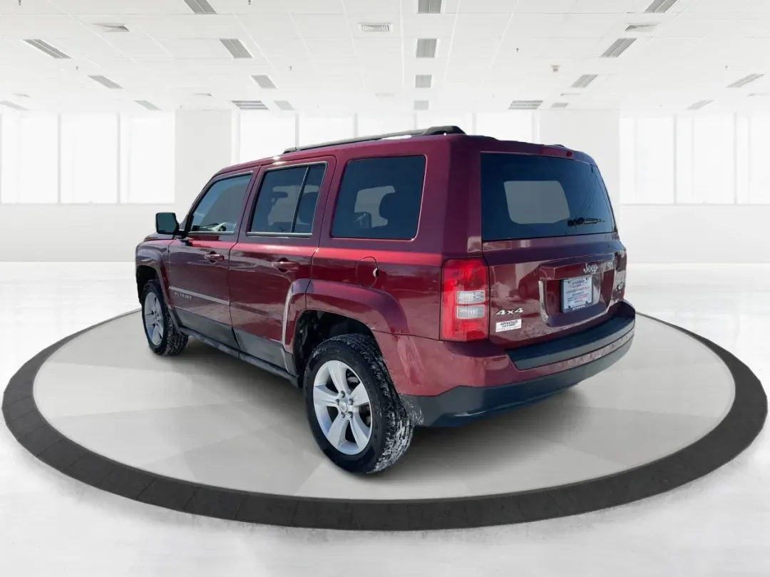 2014 Jeep Patriot Latitude (1C4NJRFB3ED) with an 2.4L I-4 DOHC engine, located at 880 E. National Road, Vandalia, OH, 45377, (937) 908-9800, 39.891918, -84.183594 - **Adventure Awaits with This 2014 Jeep Patriot Latitude Perfect for Your Next Journey!**<br /> <br /> Are you ready to embrace the thrill of the open road? Whether you're planning a weekend getaway or just need a reliable companion for your daily commute, this 2014 Jeep Patriot Latitude is designed - Photo#4