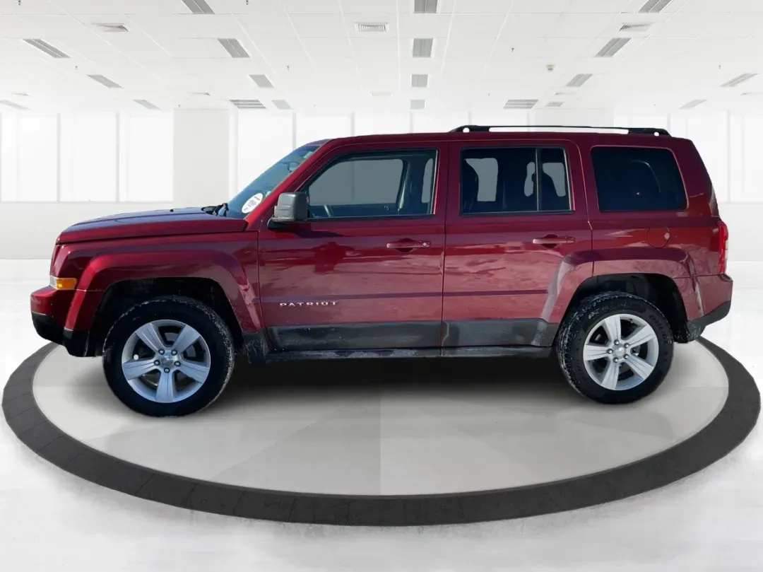 2014 Jeep Patriot Latitude (1C4NJRFB3ED) with an 2.4L I-4 DOHC engine, located at 880 E. National Road, Vandalia, OH, 45377, (937) 908-9800, 39.891918, -84.183594 - **Adventure Awaits with This 2014 Jeep Patriot Latitude Perfect for Your Next Journey!**<br /> <br /> Are you ready to embrace the thrill of the open road? Whether you're planning a weekend getaway or just need a reliable companion for your daily commute, this 2014 Jeep Patriot Latitude is designed - Photo#5