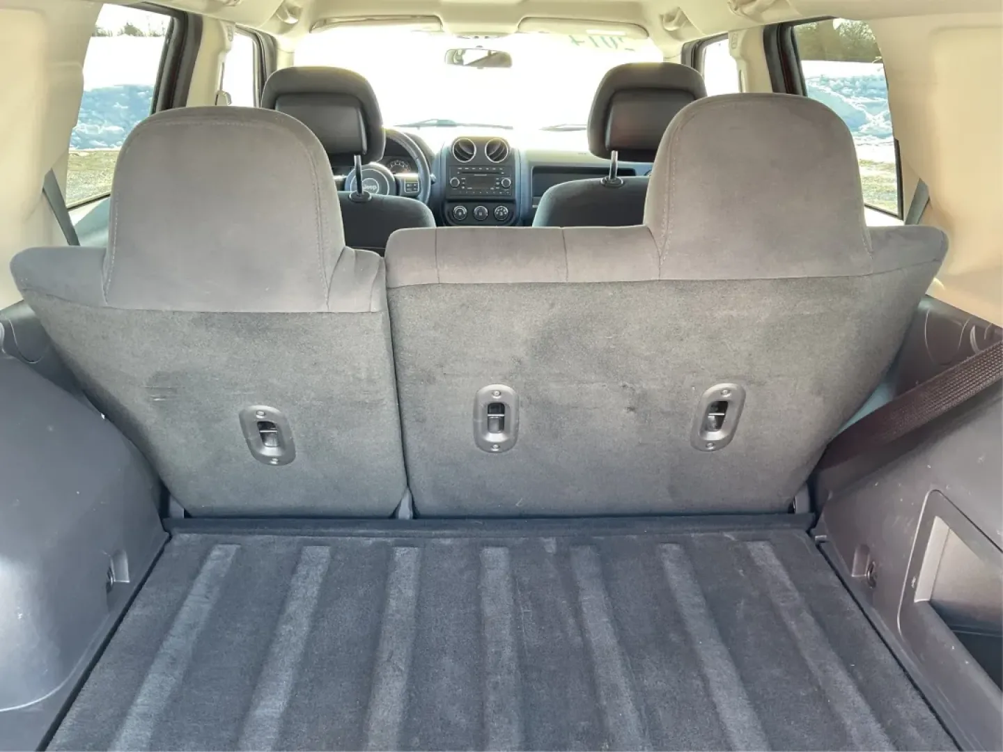 2014 Jeep Patriot (1C4NJRFB3ED) with an 2.4L I-4 DOHC engine, located at 4508 South Dixie Dr, Moraine, OH, 45439, (937) 908-9800, 39.689976, -84.218452 - **Adventure Awaits with This 2014 Jeep Patriot Latitude Perfect for Your Next Journey!**<br /> <br /> Are you ready to embrace the thrill of the open road? Whether you're planning a weekend getaway or just need a reliable companion for your daily commute, this 2014 Jeep Patriot Latitude is designed - Photo#12