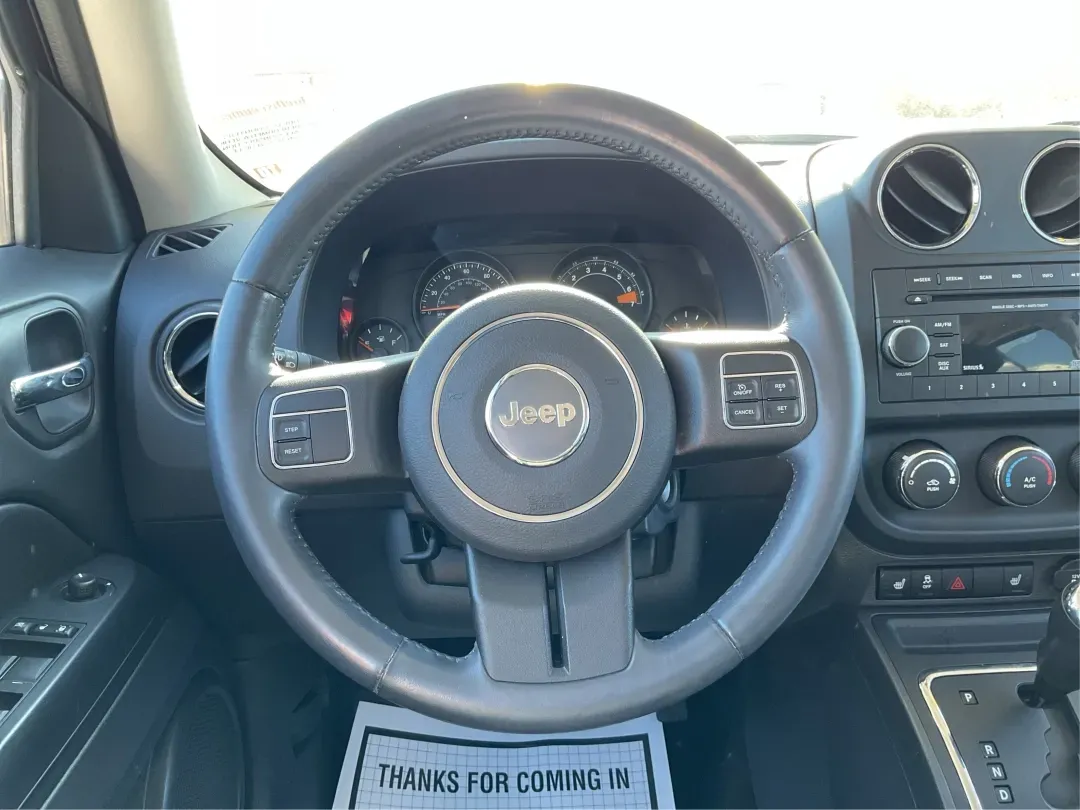 2014 Jeep Patriot Latitude (1C4NJRFB3ED) with an 2.4L I-4 DOHC engine, located at 880 E. National Road, Vandalia, OH, 45377, (937) 908-9800, 39.891918, -84.183594 - **Adventure Awaits with This 2014 Jeep Patriot Latitude Perfect for Your Next Journey!**<br /> <br /> Are you ready to embrace the thrill of the open road? Whether you're planning a weekend getaway or just need a reliable companion for your daily commute, this 2014 Jeep Patriot Latitude is designed - Photo#16