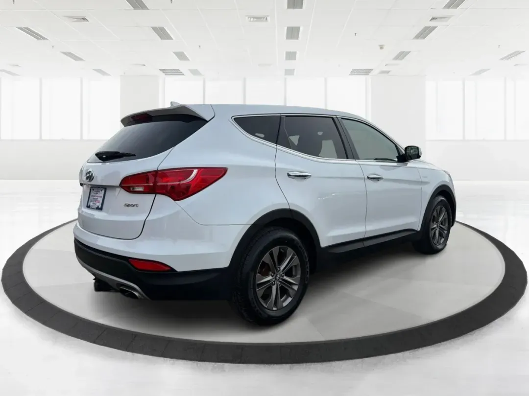 2013 Hyundai Santa Fe Sport (5XYZT3LB2DG) with an Theta II 2.4L I-4 gasoline direct injection engine, located at 1184 Kauffman Ave, Fairborn, OH, 45324, (937) 908-9800, 39.807072, -84.030914 - **Adventure Awaits: Drive the 2013 Hyundai Santa Fe Sport in Fairborn, OH!**<br /> <br /> Are you ready to elevate your lifestyle while enjoying the freedom of the open road? Look no further than the stunning 2013 Hyundai Santa Fe Sport, available now at Advantage Car and Credit in Fairborn, OH! Thi - Photo#2