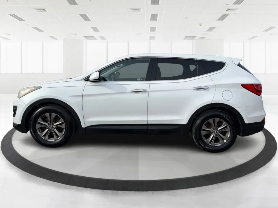 2013 Hyundai Santa Fe Sport (5XYZT3LB2DG) with an Theta II 2.4L I-4 gasoline direct injection engine, located at 1184 Kauffman Ave, Fairborn, OH, 45324, (937) 908-9800, 39.807072, -84.030914 - **Adventure Awaits: Drive the 2013 Hyundai Santa Fe Sport in Fairborn, OH!**<br /> <br /> Are you ready to elevate your lifestyle while enjoying the freedom of the open road? Look no further than the stunning 2013 Hyundai Santa Fe Sport, available now at Advantage Car and Credit in Fairborn, OH! Thi - Photo#5