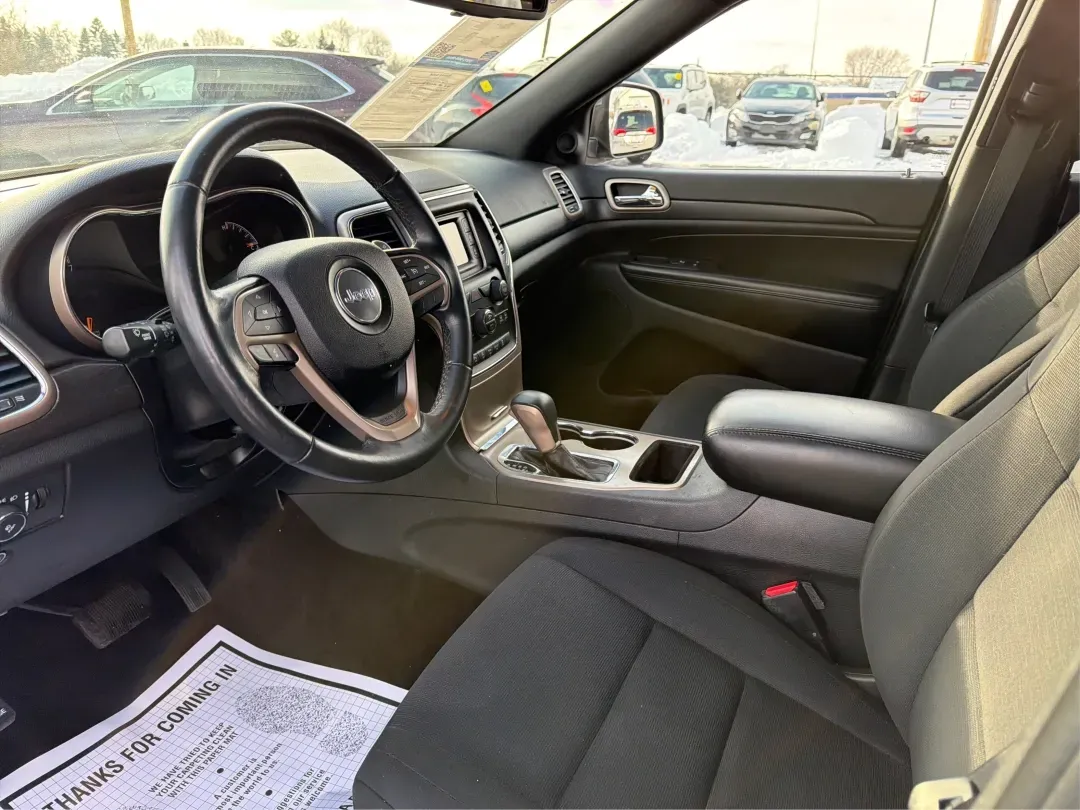 2016 Jeep Grand Cherokee Laredo (1C4RJFAG7GC) with an Pentastar 3.6L V-6 DOHC engine, located at 1230 East Main St, Xenia, OH, 45385, (937) 908-9800, 39.688026, -83.910172 - ### Experience Adventure in Comfort with the 2016 Jeep Grand Cherokee Laredo <br /> <br /> If you're seeking a vehicle that can handle everything from daily commutes to weekend getaways, look no further than the 2016 Jeep Grand Cherokee Laredo. This robust SUV is perfect for both adventurous spirits - Photo#9
