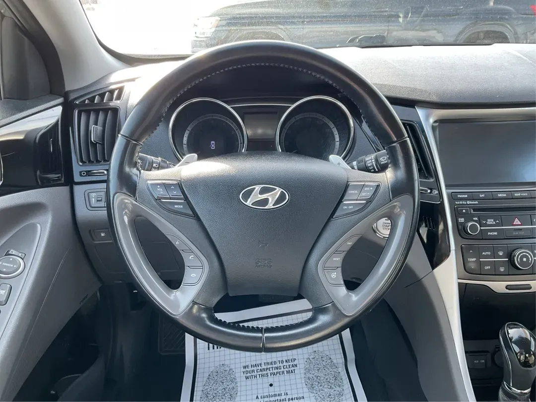 2014 Hyundai Sonata Limited 2.0T (5NPEC4AB3EH) with an 2L I-4 gasoline direct injection engine, located at 1951 S Dayton Lakeview Rd., New Carlisle, OH, 45344, (937) 908-9800, 39.890999, -84.050255 - Are you in search of the perfect blend of style, performance, and reliability for your daily commutes or family outings? Look no further! At Advantage Car and Credit in New Carlisle, OH, we proudly present this stunning 2014 Hyundai Sonata Limited 2.0T, a sedan designed for those who appreciate both - Photo#16