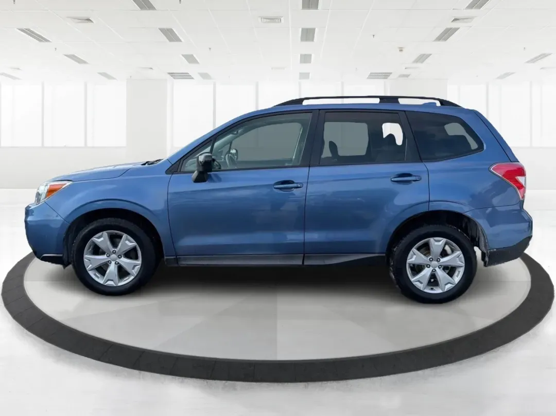 2016 Subaru Forester 2.5i Premium (JF2SJADC8GH) with an 2.5L H-4 DOHC engine, located at 1184 Kauffman Ave, Fairborn, OH, 45324, (937) 908-9800, 39.807072, -84.030914 - If you're searching for a versatile and dependable vehicle that fits perfectly into your active lifestyle, look no further than this 2016 Subaru Forester 2.5i Premium. Ideal for weekend adventures, daily commutes, and everything in between, this SUV boasts a well-rounded combination of comfort, reli - Photo#5