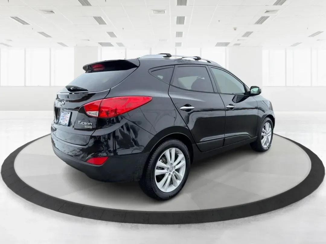 2012 Hyundai Tucson Limited (KM8JU3AC5CU) with an Theta II 2.4L I-4 DOHC engine, located at 880 E. National Road, Vandalia, OH, 45377, (937) 908-9800, 39.891918, -84.183594 - Need a dependable SUV that fits real life-school drop-offs, I-75 commuting, and weekend getaways to Taylorsville MetroPark-without the stress of traditional bank rules? This 2012 Hyundai Tucson Limited in Ash Black is a smart, comfortable choice for Vandalia drivers who want a practical daily vehicl - Photo#2