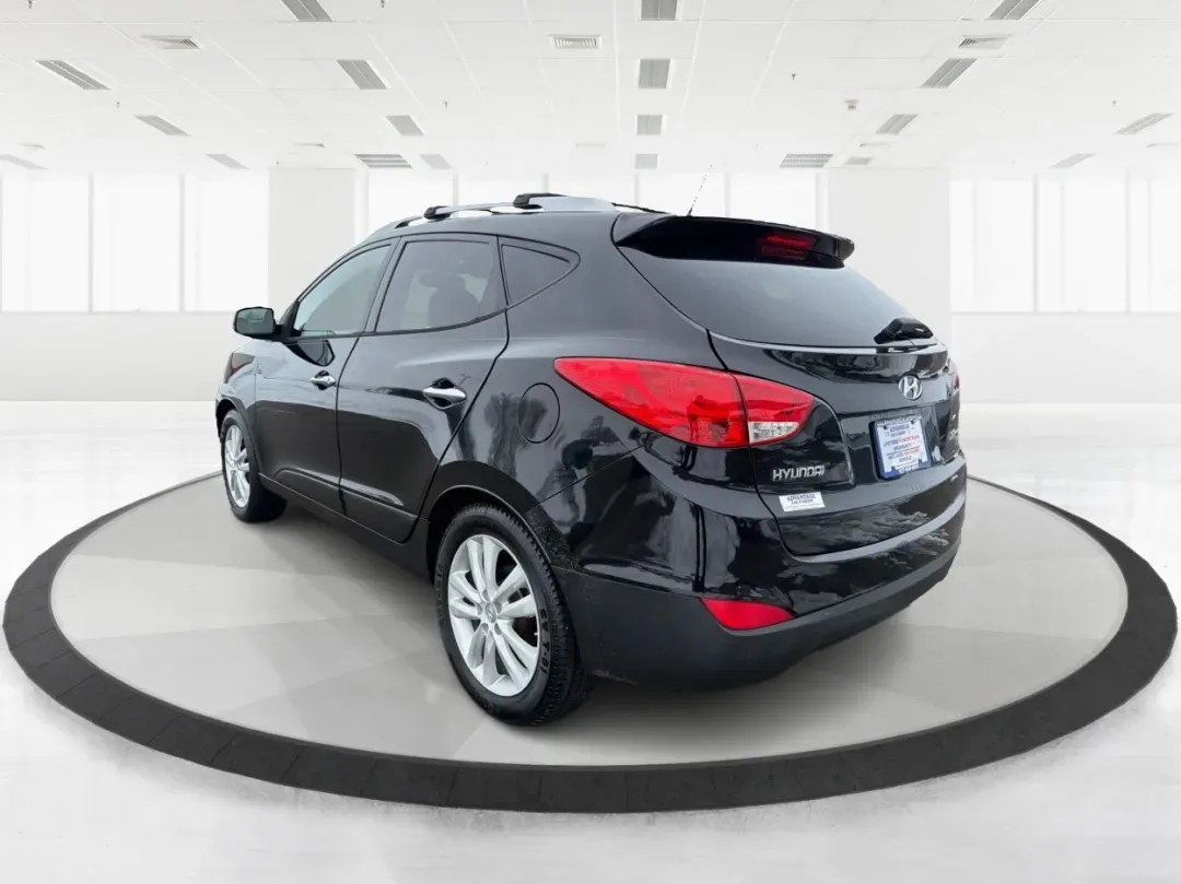 2012 Hyundai Tucson Limited (KM8JU3AC5CU) with an Theta II 2.4L I-4 DOHC engine, located at 880 E. National Road, Vandalia, OH, 45377, (937) 908-9800, 39.891918, -84.183594 - Need a dependable SUV that fits real life-school drop-offs, I-75 commuting, and weekend getaways to Taylorsville MetroPark-without the stress of traditional bank rules? This 2012 Hyundai Tucson Limited in Ash Black is a smart, comfortable choice for Vandalia drivers who want a practical daily vehicl - Photo#4