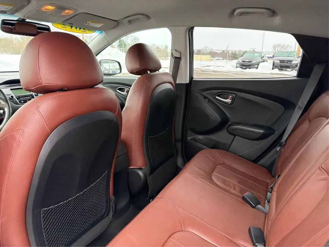 2012 Hyundai Tucson Limited (KM8JU3AC5CU) with an Theta II 2.4L I-4 DOHC engine, located at 880 E. National Road, Vandalia, OH, 45377, (937) 908-9800, 39.891918, -84.183594 - Need a dependable SUV that fits real life-school drop-offs, I-75 commuting, and weekend getaways to Taylorsville MetroPark-without the stress of traditional bank rules? This 2012 Hyundai Tucson Limited in Ash Black is a smart, comfortable choice for Vandalia drivers who want a practical daily vehicl - Photo#10