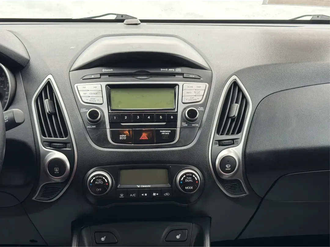 2012 Hyundai Tucson Limited (KM8JU3AC5CU) with an Theta II 2.4L I-4 DOHC engine, located at 880 E. National Road, Vandalia, OH, 45377, (937) 908-9800, 39.891918, -84.183594 - Need a dependable SUV that fits real life-school drop-offs, I-75 commuting, and weekend getaways to Taylorsville MetroPark-without the stress of traditional bank rules? This 2012 Hyundai Tucson Limited in Ash Black is a smart, comfortable choice for Vandalia drivers who want a practical daily vehicl - Photo#13