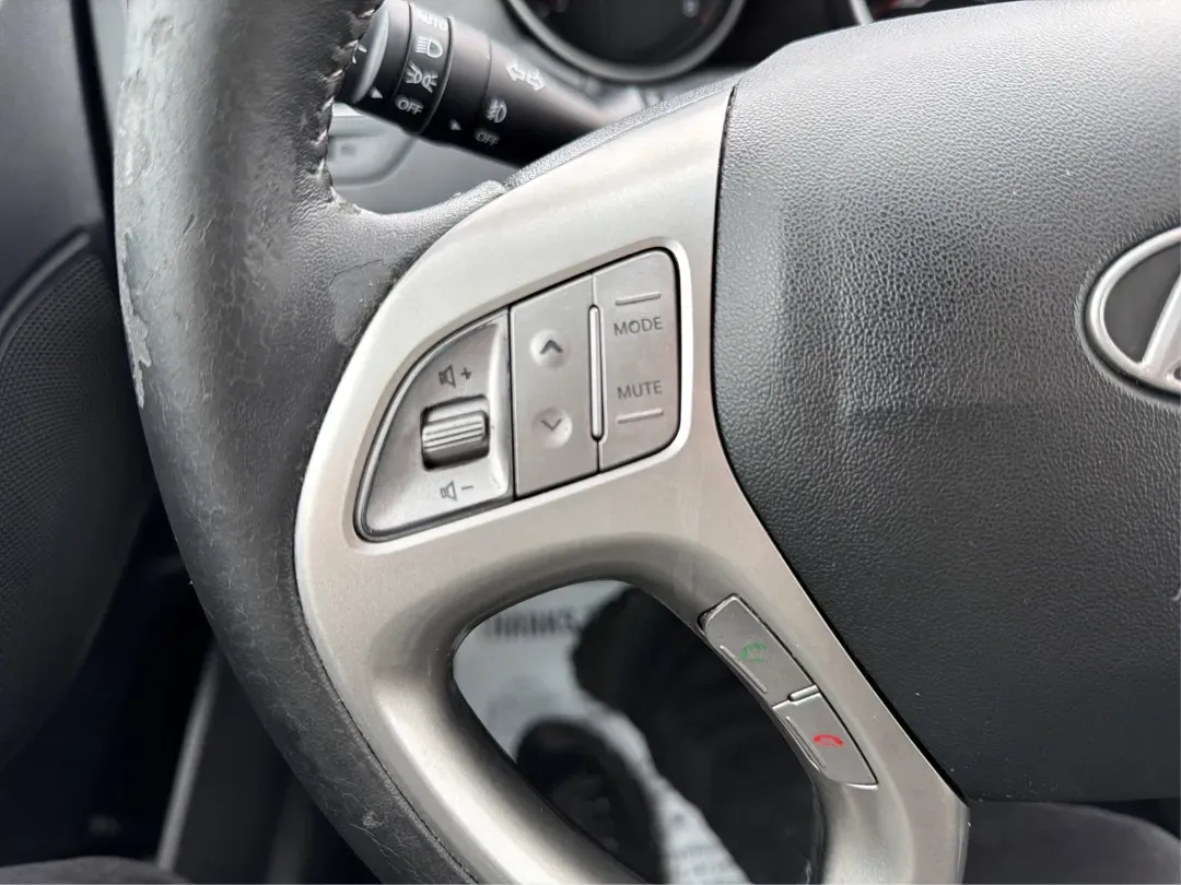 2012 Hyundai Tucson Limited (KM8JU3AC5CU) with an Theta II 2.4L I-4 DOHC engine, located at 880 E. National Road, Vandalia, OH, 45377, (937) 908-9800, 39.891918, -84.183594 - Need a dependable SUV that fits real life-school drop-offs, I-75 commuting, and weekend getaways to Taylorsville MetroPark-without the stress of traditional bank rules? This 2012 Hyundai Tucson Limited in Ash Black is a smart, comfortable choice for Vandalia drivers who want a practical daily vehicl - Photo#16