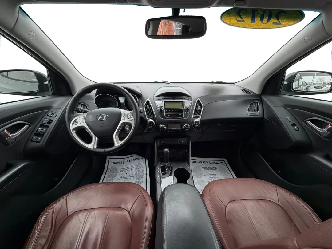 2012 Hyundai Tucson Limited (KM8JU3AC5CU) with an Theta II 2.4L I-4 DOHC engine, located at 880 E. National Road, Vandalia, OH, 45377, (937) 908-9800, 39.891918, -84.183594 - Need a dependable SUV that fits real life-school drop-offs, I-75 commuting, and weekend getaways to Taylorsville MetroPark-without the stress of traditional bank rules? This 2012 Hyundai Tucson Limited in Ash Black is a smart, comfortable choice for Vandalia drivers who want a practical daily vehicl - Photo#21