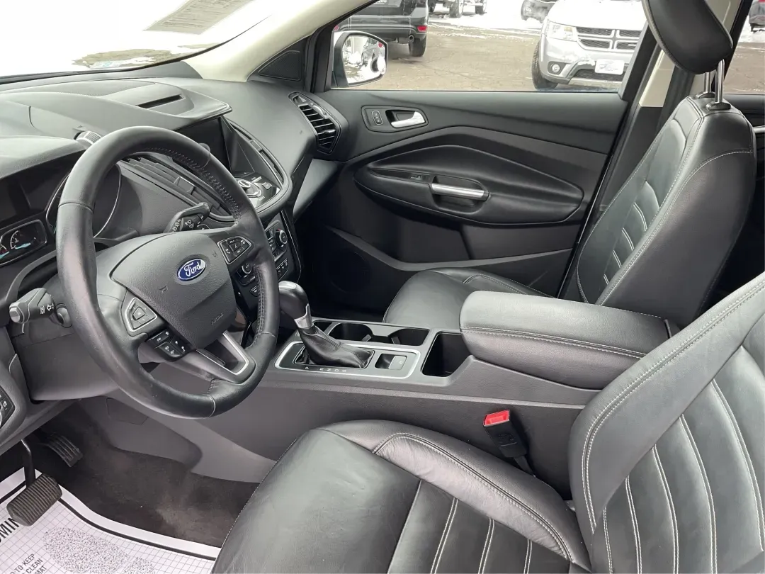 2018 Ford Escape Titanium (1FMCU9J97JU) with an EcoBoost 2L I-4 gasoline direct injection engine, located at 1099 N County Rd 25A, Troy, OH, 45373, (937) 908-9800, 40.057079, -84.212883 - Need an SUV that can handle Ohio weather, daily commutes, and weekend getaways without feeling like a compromise? This 2018 Ford Escape Titanium 4WD in Ingot Silver Metallic is built for real life in Troy-whether you're shuttling kids across town, driving a long commute down I-75, or loading up for - Photo#9