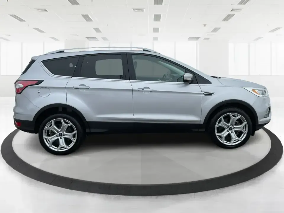2018 Ford Escape Titanium (1FMCU9J97JU) with an EcoBoost 2L I-4 gasoline direct injection engine, 6A transmission, located at 1230 East Main St, Xenia, OH, 45385, (937) 908-9800, 39.688026, -83.910172 - Need an SUV that can handle Ohio weather, daily commutes, and weekend getaways without feeling like a compromise? This 2018 Ford Escape Titanium 4WD in Ingot Silver Metallic is built for real life in Troy-whether you're shuttling kids across town, driving a long commute down I-75, or loading up for - Photo#1