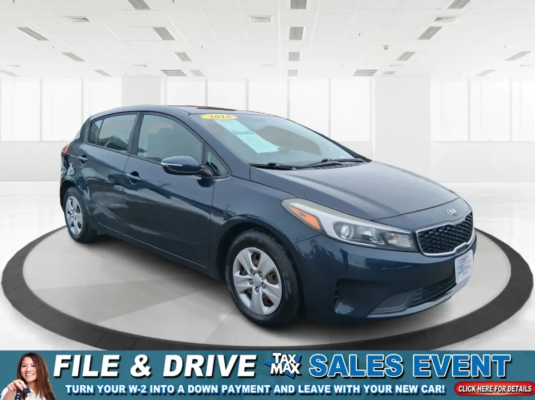 2018 Kia Forte LX (KNAFK5A89J5) with an 2L I-4 DOHC engine, located at 1951 S Dayton Lakeview Rd., New Carlisle, OH, 45344, (937) 908-9800, 39.890999, -84.050255 - Need a smart, budget-friendly ride that can handle daily commutes to Dayton, quick grocery runs, and spontaneous weekend trips without feeling cramped? This 2018 Kia Forte LX Hatchback in Gravity Blue is built for real-life driving in and around New Carlisle-easy to park, efficient to live with, and - Photo#0
