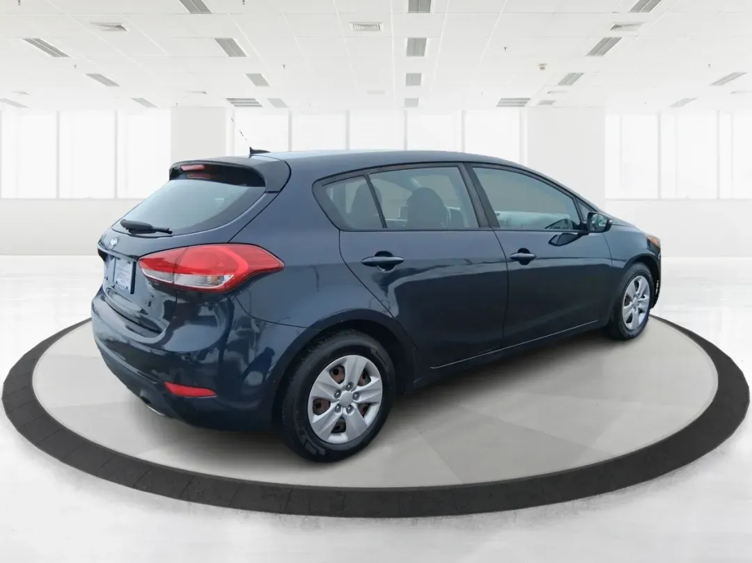2018 Kia Forte LX (KNAFK5A89J5) with an 2L I-4 DOHC engine, located at 1951 S Dayton Lakeview Rd., New Carlisle, OH, 45344, (937) 908-9800, 39.890999, -84.050255 - Need a smart, budget-friendly ride that can handle daily commutes to Dayton, quick grocery runs, and spontaneous weekend trips without feeling cramped? This 2018 Kia Forte LX Hatchback in Gravity Blue is built for real-life driving in and around New Carlisle-easy to park, efficient to live with, and - Photo#2