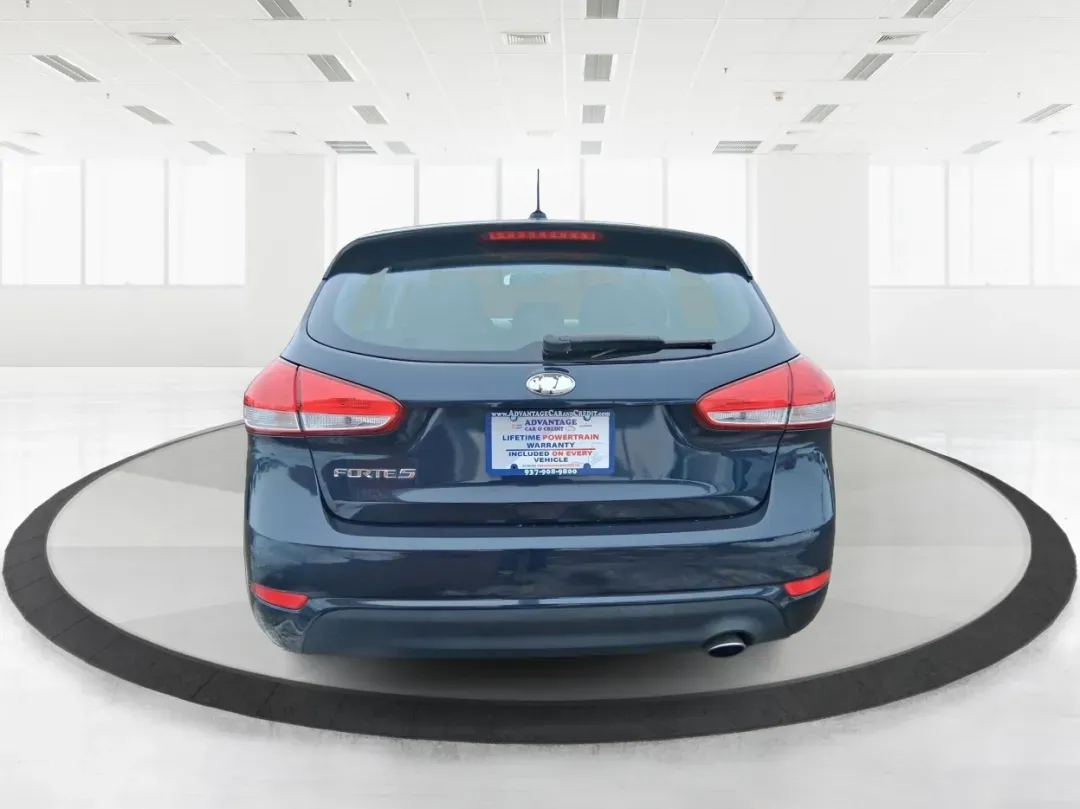 2018 Kia Forte LX (KNAFK5A89J5) with an 2L I-4 DOHC engine, located at 1951 S Dayton Lakeview Rd., New Carlisle, OH, 45344, (937) 908-9800, 39.890999, -84.050255 - Need a smart, budget-friendly ride that can handle daily commutes to Dayton, quick grocery runs, and spontaneous weekend trips without feeling cramped? This 2018 Kia Forte LX Hatchback in Gravity Blue is built for real-life driving in and around New Carlisle-easy to park, efficient to live with, and - Photo#3