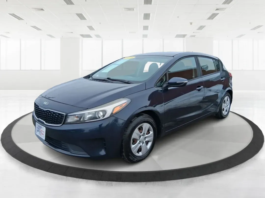 2018 Kia Forte LX (KNAFK5A89J5) with an 2L I-4 DOHC engine, located at 1951 S Dayton Lakeview Rd., New Carlisle, OH, 45344, (937) 908-9800, 39.890999, -84.050255 - Need a smart, budget-friendly ride that can handle daily commutes to Dayton, quick grocery runs, and spontaneous weekend trips without feeling cramped? This 2018 Kia Forte LX Hatchback in Gravity Blue is built for real-life driving in and around New Carlisle-easy to park, efficient to live with, and - Photo#8