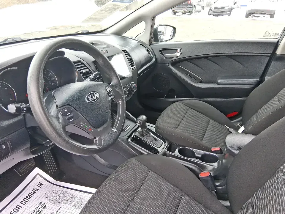 2018 Kia Forte 5-Door LX (KNAFK5A89J5) with an 2.0L L4 DOHC 16V engine, 6A transmission, located at 4508 South Dixie Dr, Moraine, OH, 45439, (937) 908-9800, 39.689976, -84.218452 - Need a smart daily driver that can handle the Monday commute down South Dixie Drive, quick grocery runs near Dayton Mall, and spontaneous weekend getaways without draining your budget? This 2018 Kia Forte 5Door LX hatchback fits real life in Moraine-easy to park, roomy for friends or family, and eff- Photo#9