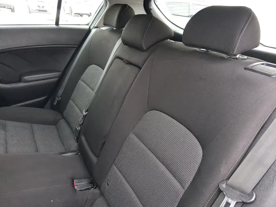 2018 Kia Forte 5-Door LX (KNAFK5A89J5) with an 2.0L L4 DOHC 16V engine, 6A transmission, located at 4508 South Dixie Dr, Moraine, OH, 45439, (937) 908-9800, 39.689976, -84.218452 - Need a smart daily driver that can handle the Monday commute down South Dixie Drive, quick grocery runs near Dayton Mall, and spontaneous weekend getaways without draining your budget? This 2018 Kia Forte 5Door LX hatchback fits real life in Moraine-easy to park, roomy for friends or family, and eff- Photo#10