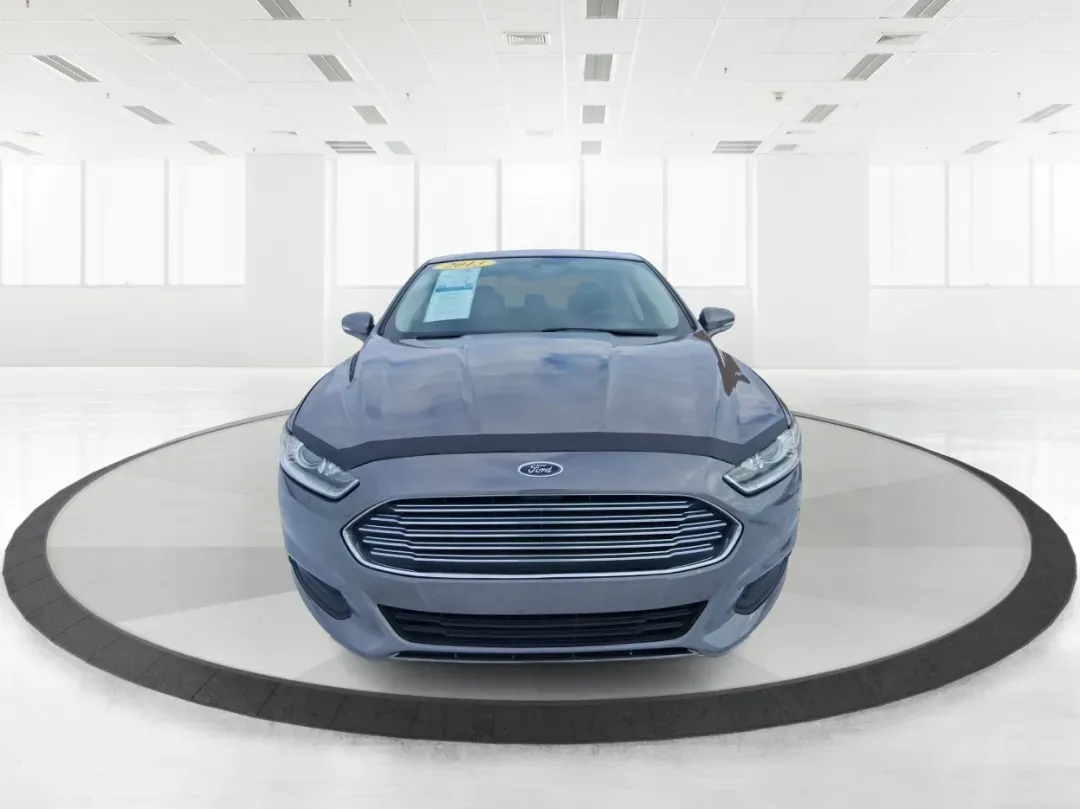 2013 Ford Fusion SE (3FA6P0H72DR) with an Other engine, located at 1184 Kauffman Ave, Fairborn, OH, 45324, (937) 908-9800, 39.807072, -84.030914 - Need a dependable commuter that can handle daily drives to Wright-Patterson AFB, weekend errands around Beavercreek, and the occasional road trip down I-675 without draining your budget? This 2013 Ford Fusion SE in Sterling Gray is a smart, comfortable sedan built for real life-great for long commut - Photo#7