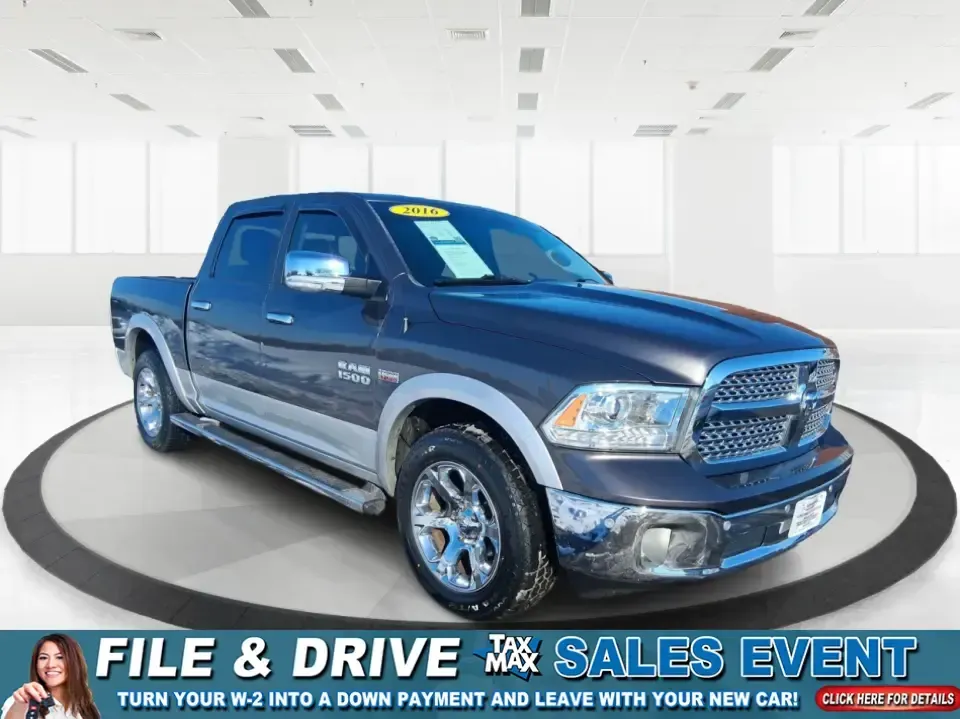 2016 Ram 1500 Laramie (1C6RR7NT1GS) with an 5.7L V8 OHV 16V engine, 6A transmission, located at 1184 Kauffman Ave, Fairborn, OH, 45324, (937) 908-9800, 39.807072, -84.030914 - Built for Ohio backroads, weekend lake runs, and the kind of workday that doesn't stop when the weather turns, this 2016 Ram 1500 Laramie Crew Cab 4WD is the truck that fits real life in Troy. Whether you're towing a trailer out toward the Miami County Fairgrounds, hauling gear for a Saturday at Tre - Photo#0