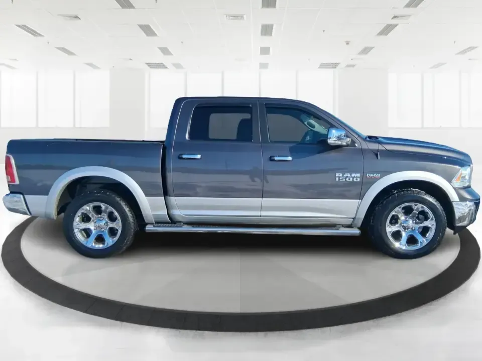 2016 Ram 1500 Laramie (1C6RR7NT1GS) with an 5.7L V8 OHV 16V engine, 6A transmission, located at 1184 Kauffman Ave, Fairborn, OH, 45324, (937) 908-9800, 39.807072, -84.030914 - Built for Ohio backroads, weekend lake runs, and the kind of workday that doesn't stop when the weather turns, this 2016 Ram 1500 Laramie Crew Cab 4WD is the truck that fits real life in Troy. Whether you're towing a trailer out toward the Miami County Fairgrounds, hauling gear for a Saturday at Tre - Photo#1