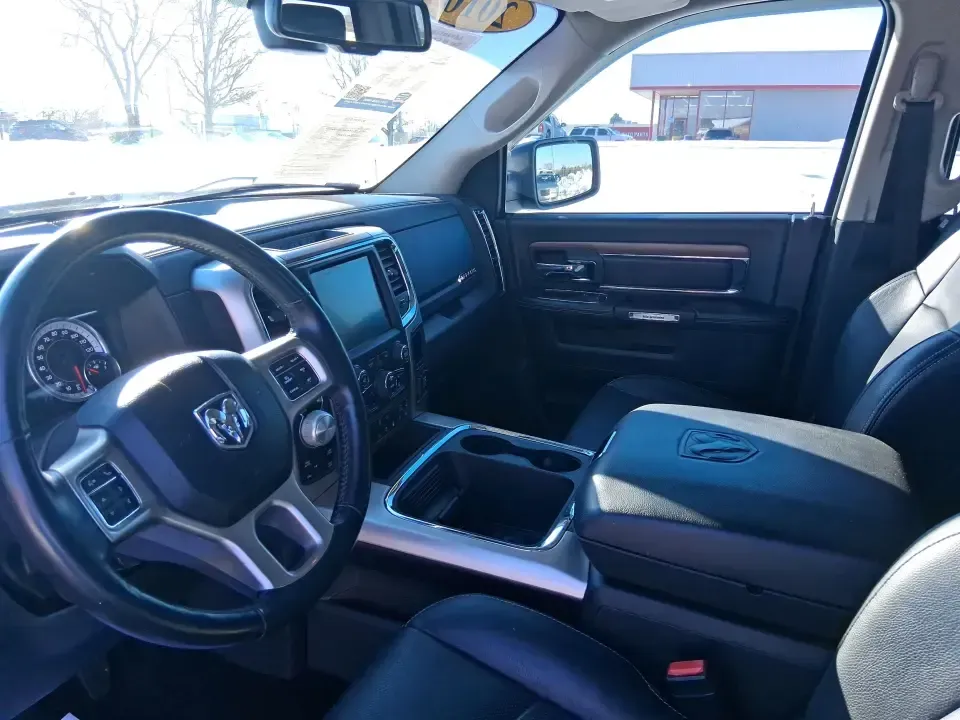 2016 Ram 1500 Laramie (1C6RR7NT1GS) with an 5.7L V8 OHV 16V engine, 6A transmission, located at 1184 Kauffman Ave, Fairborn, OH, 45324, (937) 908-9800, 39.807072, -84.030914 - Built for Ohio backroads, weekend lake runs, and the kind of workday that doesn't stop when the weather turns, this 2016 Ram 1500 Laramie Crew Cab 4WD is the truck that fits real life in Troy. Whether you're towing a trailer out toward the Miami County Fairgrounds, hauling gear for a Saturday at Tre - Photo#9