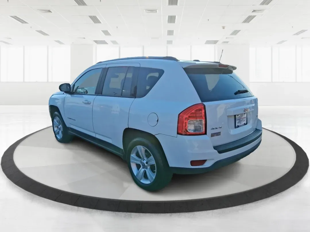 2012 Jeep Compass Latitude (1C4NJDEB4CD) with an 2.4L I-4 DOHC engine, Continuously Variable Transmission transmission, located at 8750 N County Rd 25A, Piqua, OH, 45356, (937) 908-9800, 40.164391, -84.232513 - Need a do-it-all SUV that fits real life in West Central Ohio-school drop-offs, long commutes up I75, and spontaneous weekend escapes to the trails around Johnston Farm and Indian Agency? This 2012 Jeep Compass Latitude 4WD in Bright White Clearcoat is built for that everyday adventure lifestyle, - Photo#4