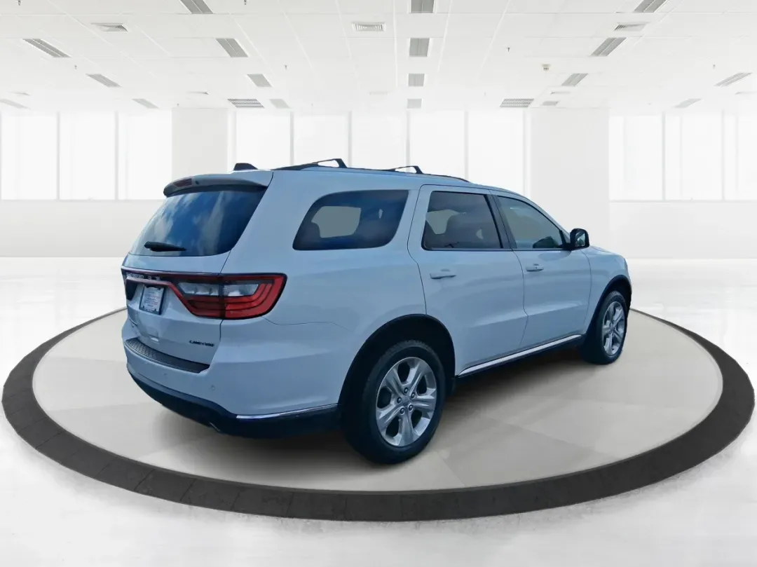 2015 Dodge Durango Limited (1C4RDJDG8FC) with an 3.6L V6 DOHC 24V engine, 8-Speed Automatic transmission, located at 8750 N County Rd 25A, Piqua, OH, 45356, (937) 908-9800, 40.164391, -84.232513 - Pack up the kids, load the cooler, and point the nose toward a weekend getaway-this 2015 Dodge Durango Limited is the kind of SUV that makes everyday life in West Central Ohio easier, from school drop-offs to road trips and everything in between. With confident 4WD/AWD capability, three-row flexibil - Photo#2