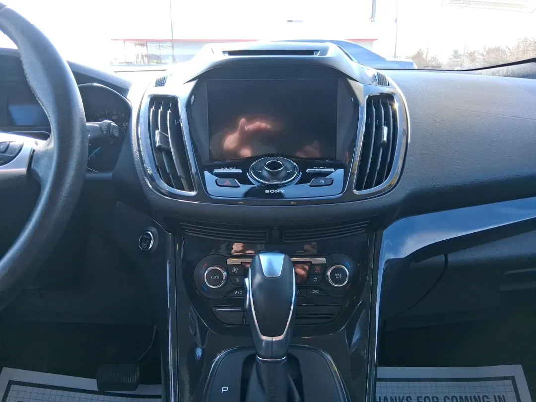 2016 Ford Escape Titanium (1FMCU9J94GU) with an 2.0L L4 DOHC 16V engine, 6-Speed Automatic transmission, located at 1951 S Dayton Lakeview Rd., New Carlisle, OH, 45344, (937) 908-9800, 39.890999, -84.050255 - Picture your next Ohio weekend: a quick grocery run through New Carlisle, a comfortable commute toward Dayton, and then a spontaneous road trip out I70 with the family-without worrying about weather, cargo space, or comfort. This 2016 Ford Escape Titanium in sleek Magnetic is the kind of compact SUV - Photo#13