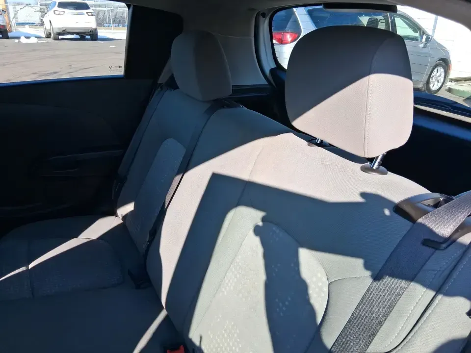 2016 Chevrolet Sonic LS Auto (1G1JA6SH4G4) with an 1.8L L4 DOHC 24V engine, 6A transmission, located at 1230 East Main St, Xenia, OH, 45385, (937) 908-9800, 39.688026, -83.910172 - Need a smart, easy-to-park commuter that can also handle grocery runs, campus life, and weekend getaways without draining your budget? This 2016 Chevrolet Sonic LS Auto Hatchback is built for real-life Fairborn living-zipping down I675 for work, cruising over to Wright-Patterson Air Force Base, or h - Photo#9