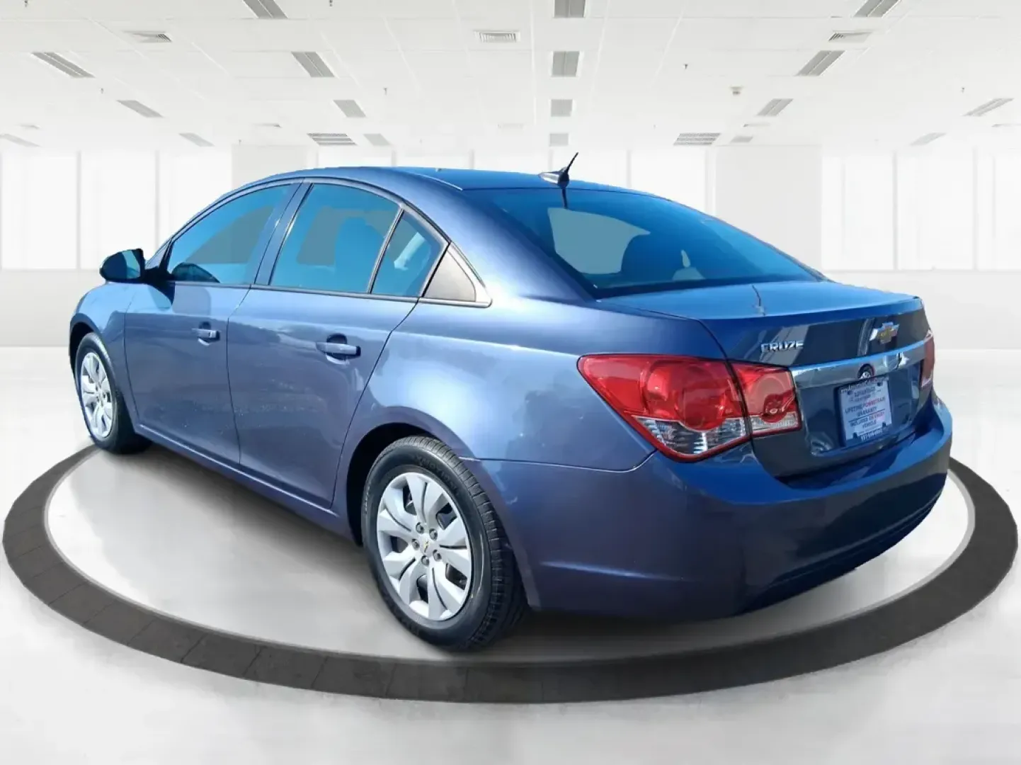 2014 Chevrolet Cruze LS Auto (1G1PA5SH3E7) with an ECOTEC 1.8L I-4 DOHC engine, 6-Speed Automatic transmission, located at 1951 S Dayton Lakeview Rd., New Carlisle, OH, 45344, (937) 908-9800, 39.890999, -84.050255 - Need a smart, budget-friendly commuter that can handle daily school drop-offs, I-75 traffic, and weekend errands without draining your wallet at the pump? This 2014 Chevrolet Cruze LS Auto is a practical, easy-to-live-with sedan that fits real Moraine lifestyles-whether you're commuting toward Downt - Photo#4