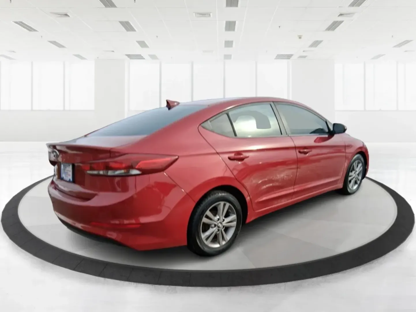 2017 Hyundai Elantra SE (KMHD84LF5HU) with an Nu 2L I-4 DOHC engine, 6A transmission, located at 1099 N County Rd 25A, Troy, OH, 45373, (937) 908-9800, 40.057079, -84.212883 - Planning a reliable daily commute from Troy to Dayton, a fuel-friendly run to the Miami Valley Centre Mall, or an easy weekend escape up I75? This 2017 Hyundai Elantra SE in eye-catching Scarlet Red Pearl is the kind of practical sedan that fits real life-comfortable for long drives, small enough fo - Photo#2